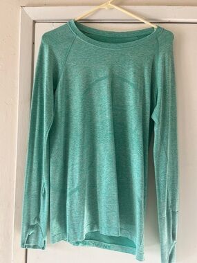 Lululemon Light Teal Long Sleeve Performance Top